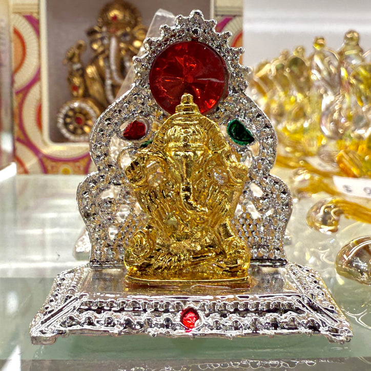 Shri Ganesh Ji Idol (2”) – Golden Miniature Murti with Silver Throne Base & Red Gem Halo