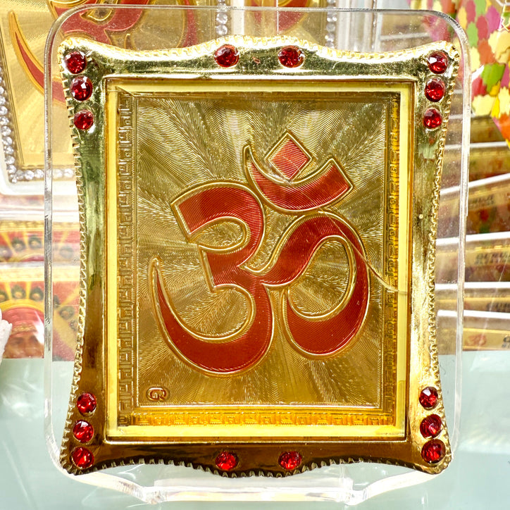 Golden Om Frame (3”) – Compact Red & Gold Acrylic Murti with Red Gem Accents & Built-in Stand