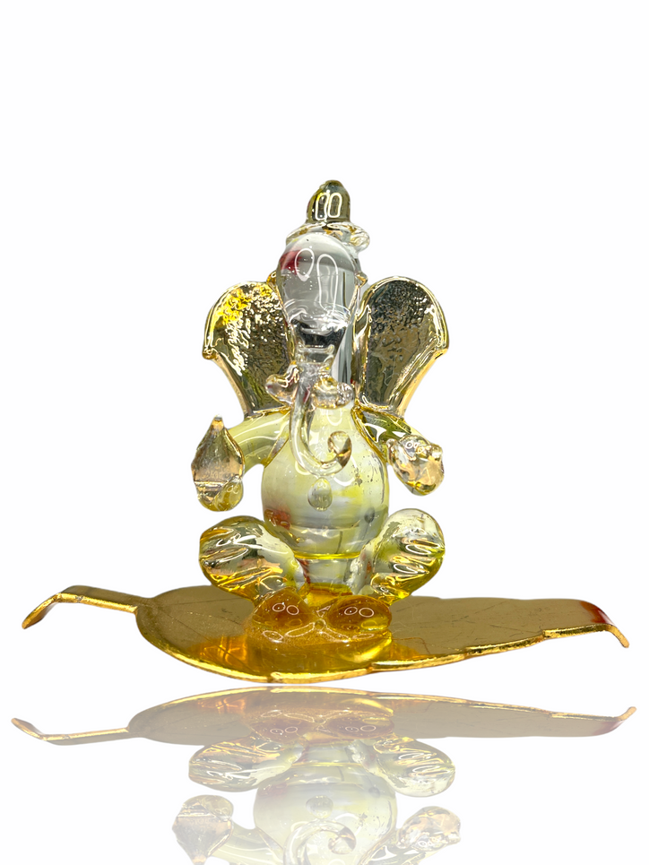 Gold & Glass Sri Ganesh ji Sitting on Leaf
