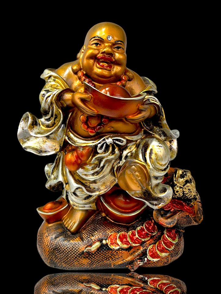 Laughing Buddha holding ingot