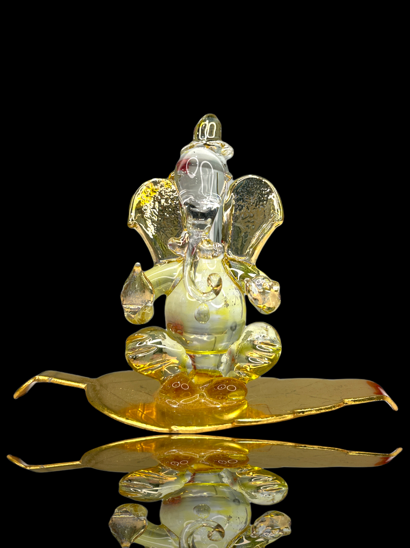 Gold & Glass Sri Ganesh ji Sitting on Leaf