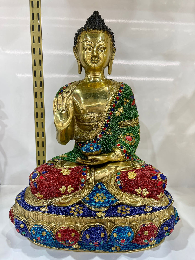 Brass Buddha with Stonework