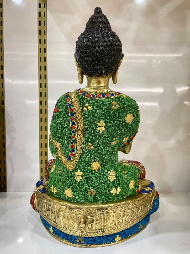 Brass Buddha with Stonework