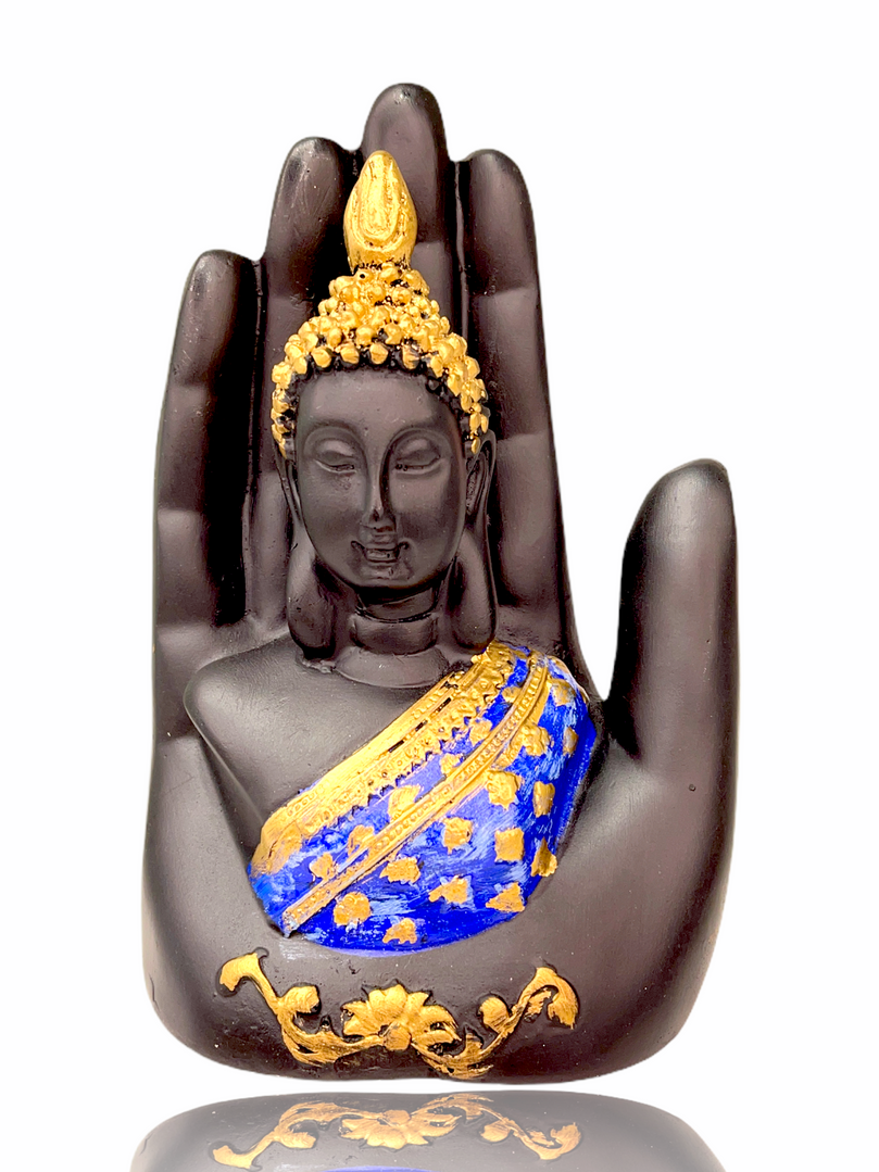 Gold/blue buddha in palm