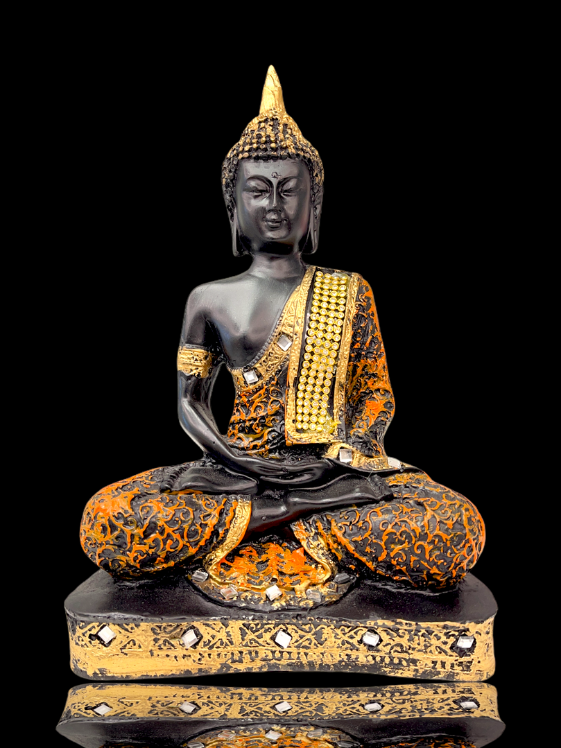 black & orange crystal studded buddha meditating