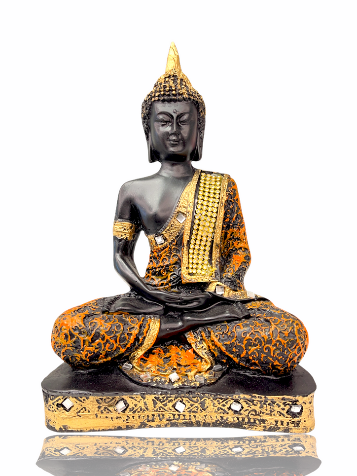 black & orange crystal studded buddha meditating